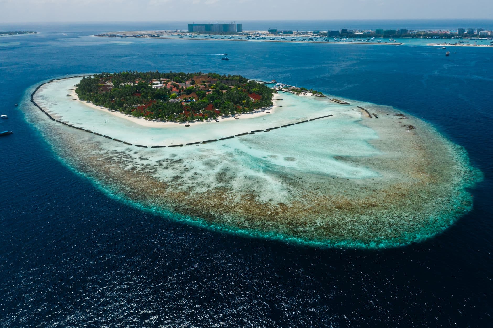 A small resort island surrounded by a clear lagoon